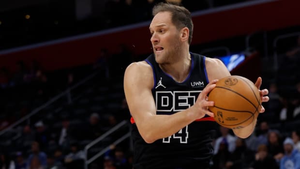 Detroit Pistons forward Bojan Bogdanović grabs the rebound in the first half against the Minnesota Timberwolves at Little Caesars Arena in Detroit on Jan. 17, 2024
